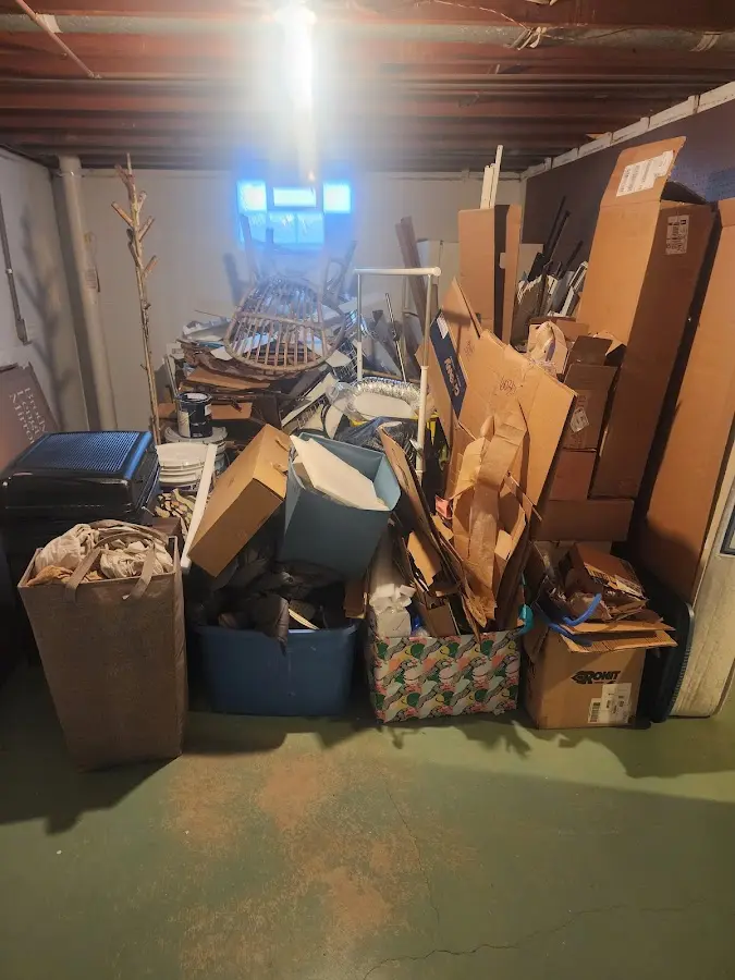 Roll-off dumpster container at job site for 15 Yard Dumpster Rental in Mason